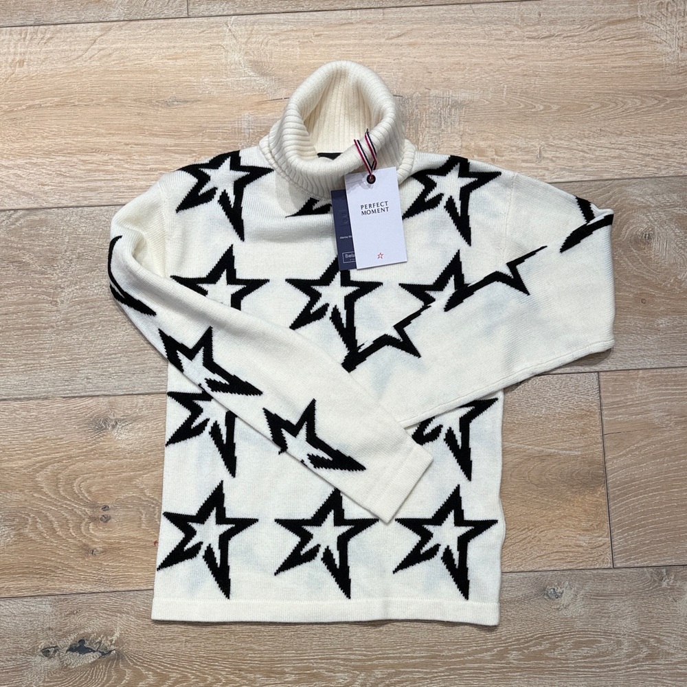 Perfect Moment Cream Turtleneck Sweater with Black Star Pattern